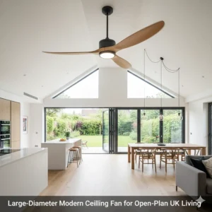 A large-diameter modern ceiling fan with timber blades in an open-plan kitchen and dining area.