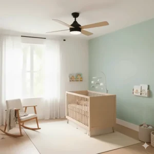 A silent-motor black ceiling fan with lights installed in a baby's nursery to show quiet operation for sleeping.