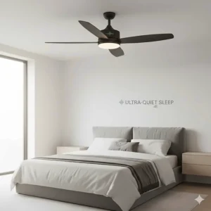 A sleek, silent-running black ceiling fan fitted above a double bed in a modern, minimalist UK bedroom.