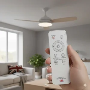 Close-up of a handheld remote control for a ceiling fan used to dim the LED light and adjust the reversible motor settings.