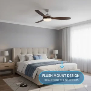 Flush mount LED ceiling fan with light designed for lower UK ceiling heights in a modern bedroom setting.