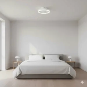 Minimalist white modern fandelier with hidden blades installed in a bright British master bedroom.
