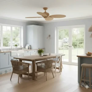 Coastal themed kitchen-diner featuring a woven rattan ceiling fan above a wooden dining table.