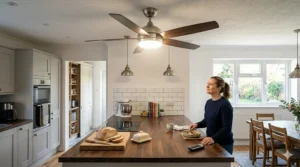 A photorealistic example of a flush-mount ceiling fan with a bright light fitting specifically designed to save space in typical UK properties with low ceiling heights.