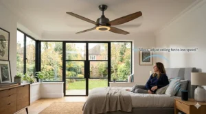 Alt text for image 3: An illustration of a person in a bedroom using a voice command to adjust the speed of a timber-blade ceiling fan.