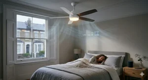 A sleek white smart home ceiling fan installed in a master bedroom, featuring a quiet motor for night-time use in a UK home.