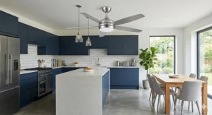 Industrial-style brushed chrome ceiling fan design fitted in an open-plan kitchen.