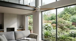 A technical diagram and cutaway illustration detailing standard wiring and bracket installation for a large, contemporary ceiling fan on a high ceiling.