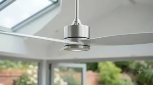 Sleek brushed chrome large ceiling fan suitable for conservatory cooling.