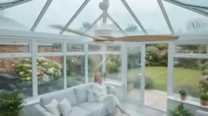 Illustrating the winter mode of an energy-efficient conservatory fan to redistribute warm air.