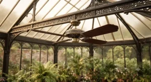 Traditional style large ceiling fan mounted in a Victorian-style conservatory.
