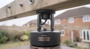 Diagram or clean shot of a quiet DC motor ceiling fan installed in an outdoor garden structure.
