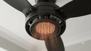 Close-up detail of the integrated safety grille and heating element on a reversible UK-certified ceiling fan.