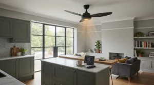 Stylish black ceiling fan with heating mode installed in a contemporary UK open-plan kitchen and dining area.