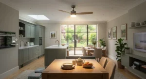 Inverter ceiling fan with an integrated dimmable LED light kit illuminating a dining table space.