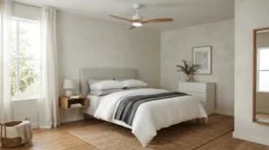 A quiet ceiling fan with timer providing gentle cooling in a minimalist guest bedroom