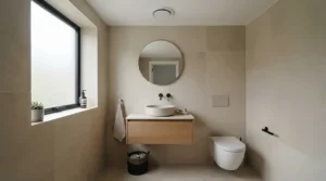 A moisture resistant polished chrome fan for small bathroom ceiling operating quietly in a steam-free en-suite.