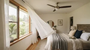 Staying cool on a warm evening with a programmed sleep timer ceiling fan.